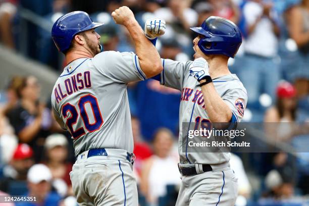 Mark Canha of the New York Mets celebrates his three-run home run with Pete Alonso against the Philadelphia Phillies during the seventh inning of a...