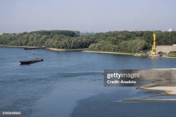 Commercial ships are anchored on the Danube river nearby Giurgiu in Southern Romania on August 20, 2022. The Danube river, second longest river in...