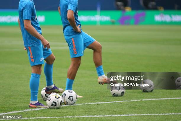 Legs of FC Zenit football players playing ball seen during the Russian Premier League football match between Zenit Saint Petersburg and Torpedo...