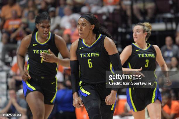 Dallas Wings forward Kayla Thornton reacts to making a three point shot during Game 2 of the First Round of the WNBA Playoffs between the Dallas...
