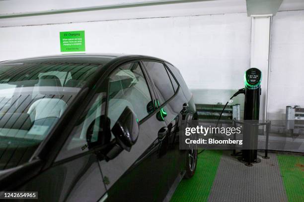 An electric car charging port at a car park in Aberdeen, UK, on Tuesday, July 19, 2022. Aberdeen in northeast Scotland is trying to make the leap...