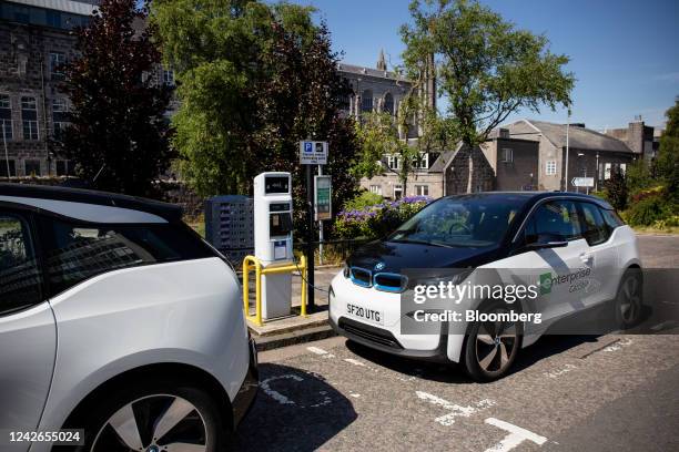 Plug-in electric vehicle rental car charging at a designated EV parking place in Aberdeen, UK, on Monday, July 18, 2022. Aberdeen in northeast...