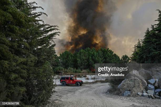 Smoke rises in the sky as wildfires continue to rageÂ in Sao Tome do Castelo, Portugal on July August 22, 2022. Since yesterday early morning,...