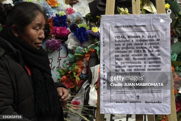 Members of social organizations hold a mock burial for the death of the salary, in reference to wages that are not keeping up with inflation, in...