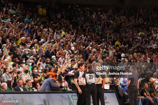 Fans support the Seattle Storm during the game against the Washington Mystics during Round 1 Game 2 of the 2022 WNBA Playoffs on August 21, 2022 at...