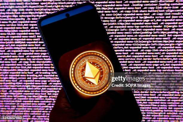 In this photo illustration an Ethereum logo seen displayed on an android smartphone.