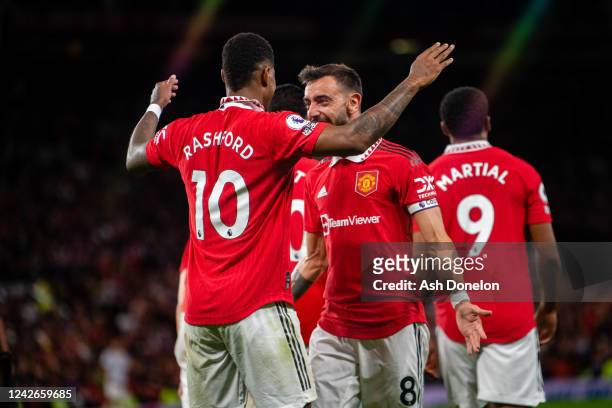 Marcus Rashford of Manchester United celebrates scoring a goal to make the score 2-0 with Bruno Fernandes during the Premier League match between...