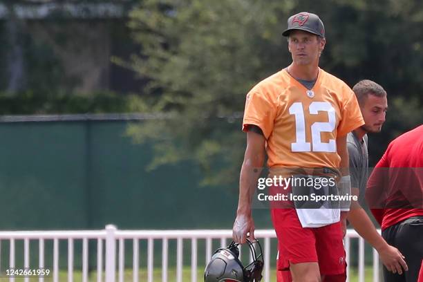 Tampa Bay Buccaneers quarterback Tom Brady watches the action on the far side of the practice field during the Tampa Bay Buccaneers Training Camp on...