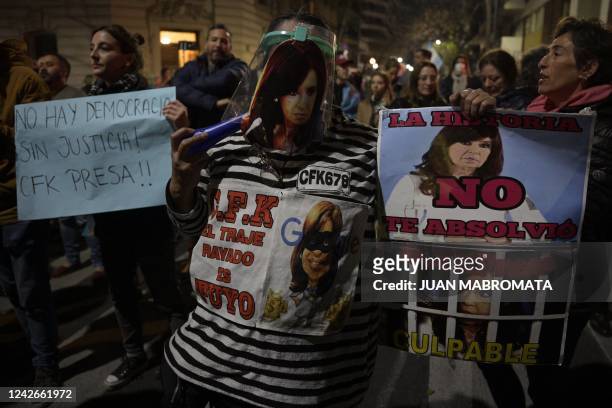 People demonstrate against Argentina's Vice-President Cristina Fernandez de Kirchner outside her apartment in Buenos Aires on August 22 after a...