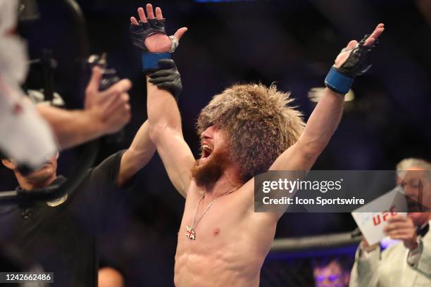 Merab Dvalishvili celebrates his victory over Jose Aldo in their Bantamweight bout during the UFC 278 at the Vivint Arena on August 20, 2022 in Salt...