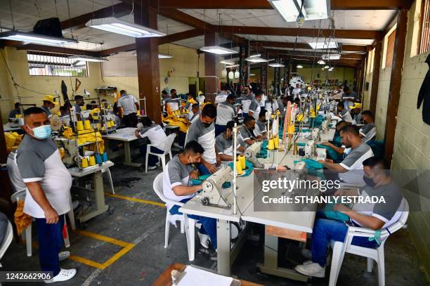 Inmates sew uniforms as part of the government's "Zero Leisure Plan" which offers several rehabilitation and reintegration programs and aims for the...