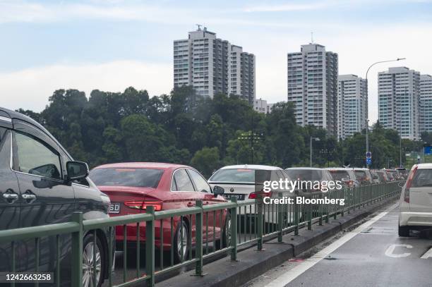 Cars travel from Malaysia to Singapore on the JohorSingapore Causeway in Johor Bahru, Malaysia, on Sunday, Aug. 14, 2022. Singapores strong exchange...