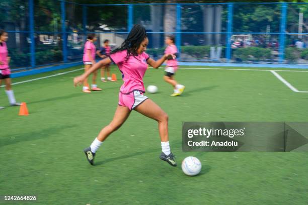 Soccer player girl dribbles during a training session at a soccer training facility in Barranquilla, Colombia on August 06, 2022. For the past four...