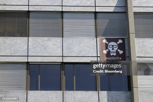 Skull and crossbones sign on the exterior of Swatch Group AG's headquarters in Biel, Switzerland, on Wednesday, Jul. 6, 2022. Swatch Chief Executive...