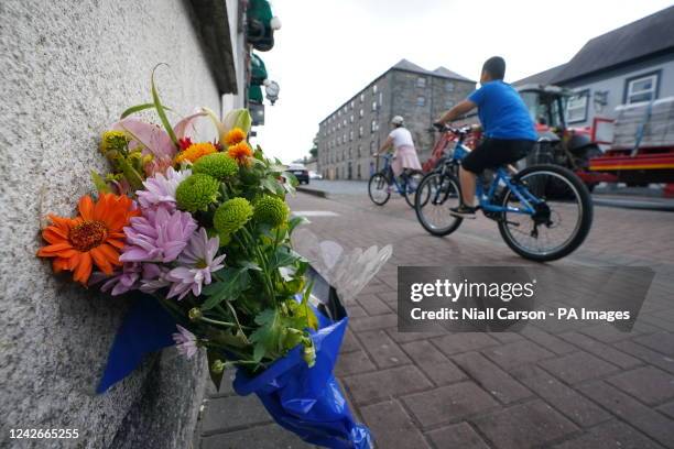 Flowers at the scene in Monasterevin, Co Kildare, where Dylan McCarthy, from Kilmallock in County Limerick was assaulted on Sunday and later died...