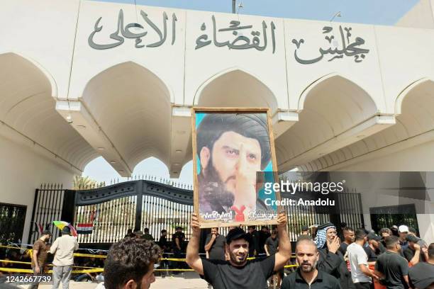 Supporters of Shiite cleric Moqtada al-Sadr start sit-in protest in front of the Supreme Judicial Council building in Baqhdad, Iraq on August 23,...