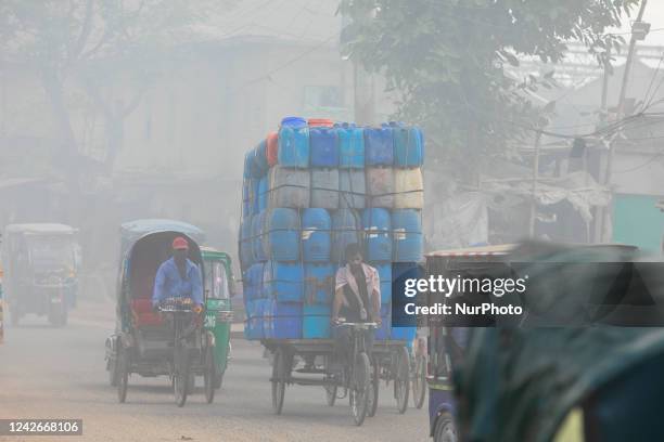 Air polluted area as smoke rises from a re-rolling mill in Dhaka, Bangladesh on August 20, 2022. Air pollution levels in developing countries such as...