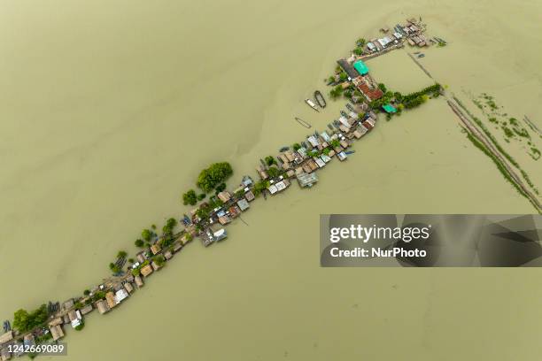 An aerial view of coastal area which is isolated because of the climate change. Due to climate change, again rising tides collapsing the embankments...