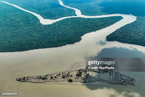 An aerial view of coastal area which is isolated because of the climate change. Due to climate change, again rising tides collapsing the embankments...