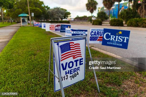 Vote Here sign outside of a polling station on August 23, 2022 in West Palm Beach, Florida. Florida voters will head to the polls today to determine...