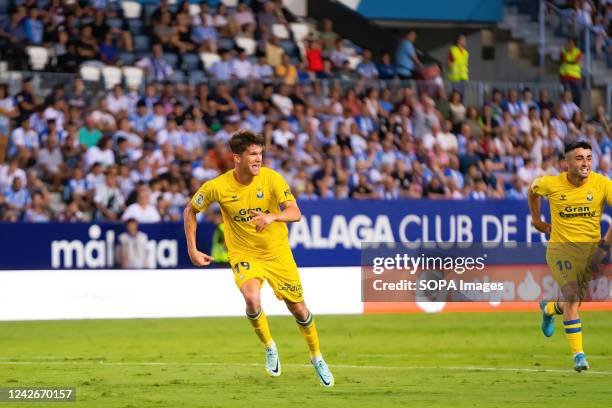 Marc Cardona celebrates after scoring a goal during the LaLiga Smartbank 2022/2023 match between Malaga CF and UD Las Palmas at La Rosaleda Stadium....