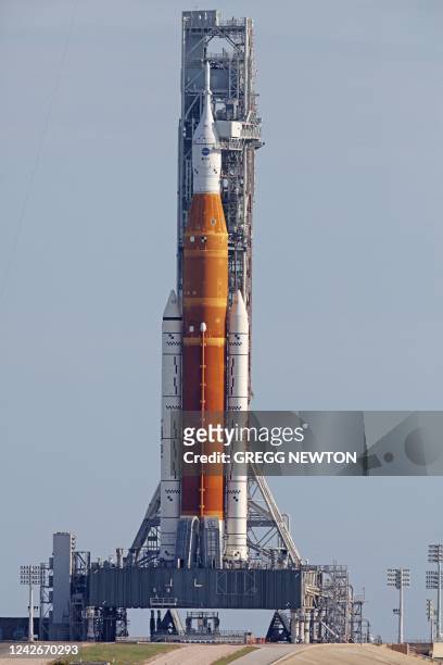The Artemis I unmanned lunar rocket sits on the launch pad at the Kennedy Space Center in Cape Canaveral, Florida, on August 23, 2022 before its...