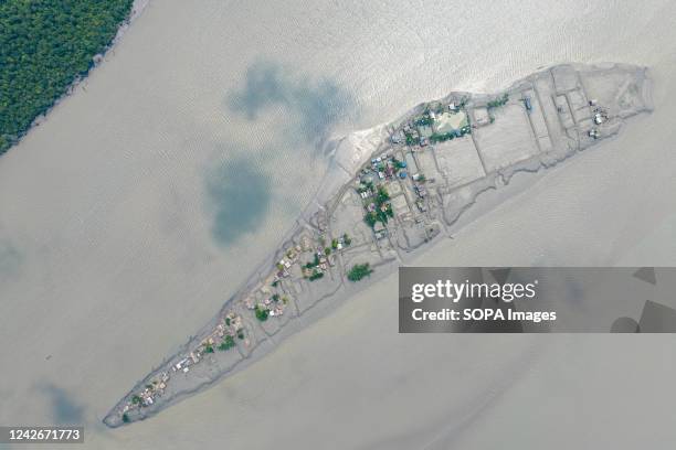 Aerial view of the isolated part of Kalabogi village due to heavy high tide in Khulna. Not too long ago Kalabogi, a coastal village in Bangladesh,...