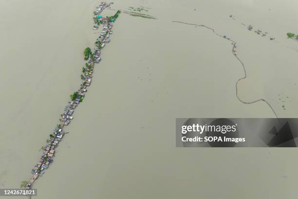 Aerial view of Kalabogi village during the high tide in Khulna. Not too long ago Kalabogi, a coastal village in Bangladesh, was full of cultivable...