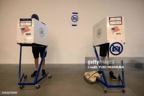 People vote during Primary Election Day on August 23, 2022 in New York. - The US special election is being viewed as the last bellwether of the...