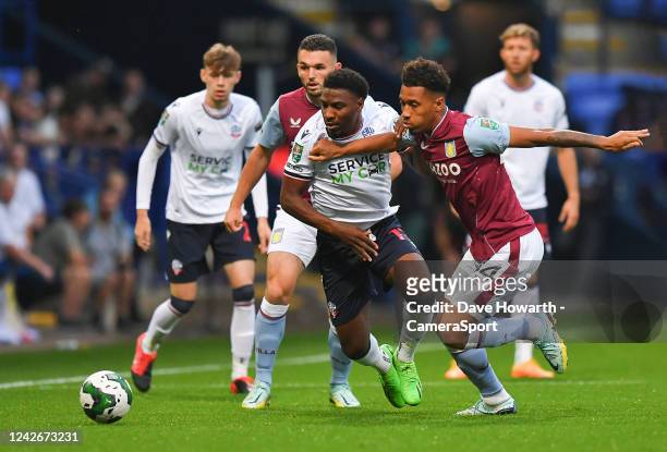 Bolton Wanderers' Oladapo Afolayan battles with Aston Villa's Boubacar Kamara during the Carabao Cup Second Round match between Bolton Wanderers and...