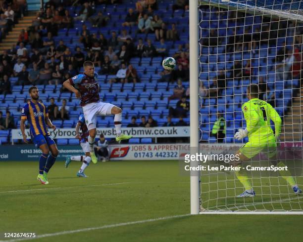 Burnley's Johann Gudmundsson volley goes over the bar during the Carabao Cup Second Round match between Shrewsbury Town and Burnley at New Meadow on...