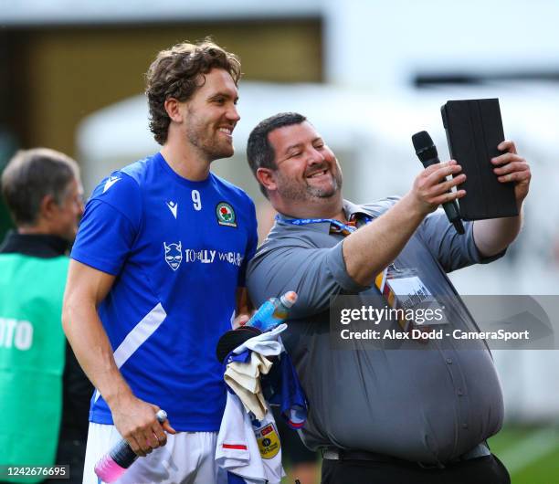 The Bradford City stadium announcer has a selfie with Blackburn Rovers' Sam Gallagher during the Carabao Cup Second Round match between Bradford City...