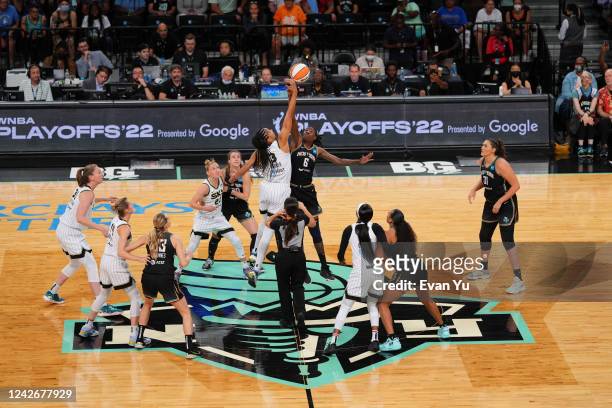 Natasha Howard of the New York Liberty and Candace Parker of the Chicago Sky go up for the opening tip off during Round 1 Game 3 of the 2022 WNBA...
