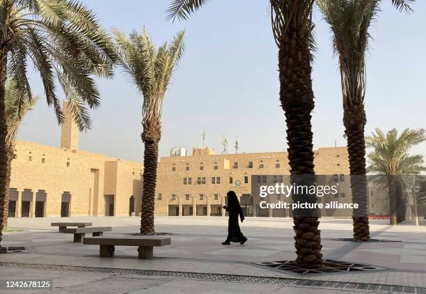 August 2022, Saudi Arabia, Riad: A woman walks across Al-Safat Square, where public executions used to take place. To this day, Saudi Arabia is...