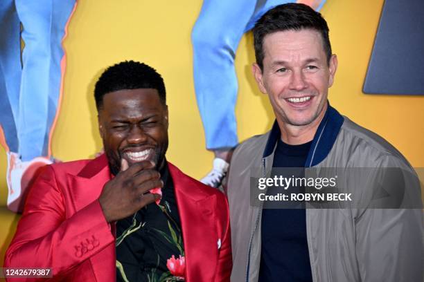 Actor and comedian Kevin Hart and US actor Mark Wahlberg arrive for the premiere of "Me Time" at the Regency Village Theatre in Westwood, Los...