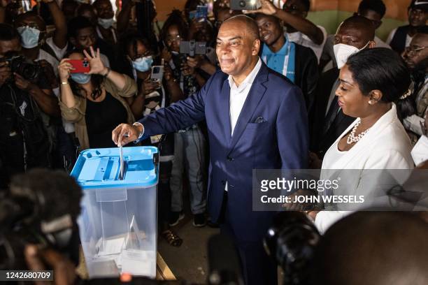 Leader of the opposition party, The National Union for the Total Independence of Angola, Adalberto Costa Junior , casts his ballot at a polling...