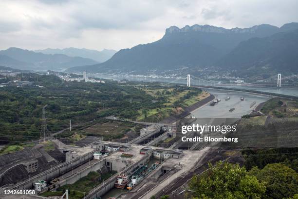 Barges enter dam locks near the Three Gorges Dam in Yichang, China, on Tuesday, Aug. 23, 2022. An extreme summer has taken a toll on Asia's longest...