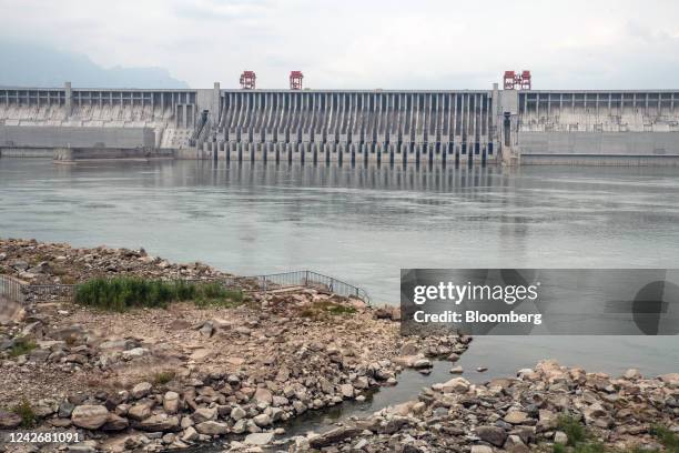 The Three Gorges Dam and low water levels along the Yangtze River in Yichang, China, on Tuesday, Aug. 23, 2022. An extreme summer has taken a toll on...