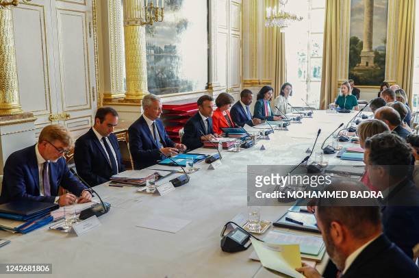 France's Agriculture Minister Marc Fesneau, France's Defence Minister Sebastien Lecornu, France's Economy Minister Bruno Le Maire, France's President...