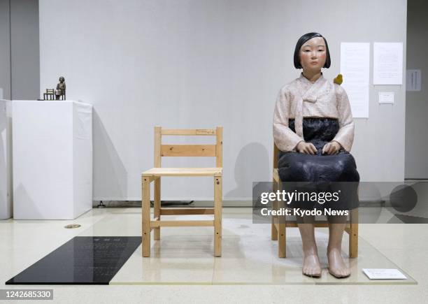 Photo taken on Aug. 24 at a gallery in the central Japan city of Nagoya shows a statue symbolizing "comfort women" who were forced to work in the...
