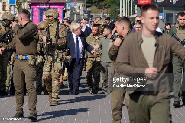 President of Ukraine Volodymyr Zelenskyi and Prime Minister of Great Britain Boris Johnson walk along Khreshchatyk Street, where an exhibition of...