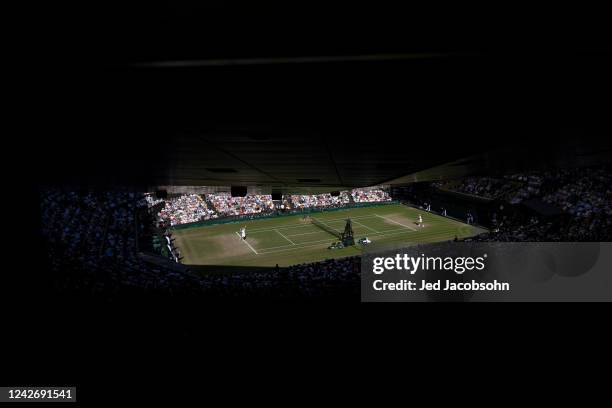 Novak Djokovic of Serbia, left, in action during the Mens Singles Final against Nick Kyrgios of Australia at The Wimbledon Lawn Tennis Championship...