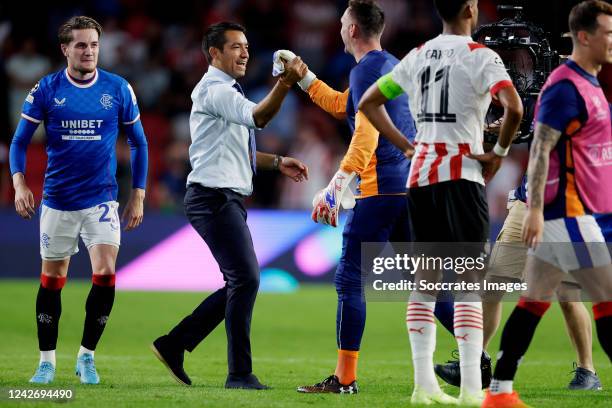 Coach Giovanni van Bronckhorst of Rangers FC celebrates the qualification for the Champions League during the UEFA Champions League match between PSV...