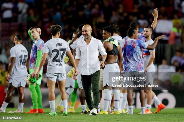 Abde Ezzalzouli of FC Barcelona Coach Pep Guardiola of Manchester City during the Club Friendly match between FC Barcelona v Manchester City at the...