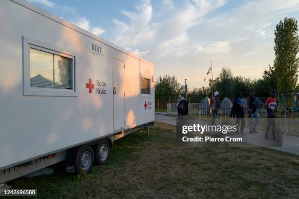 The Red Cross medical post is seen closed due to security reasons as hundreds of refugees sleep outside the refugee center on August 24, 2022 in Ter...