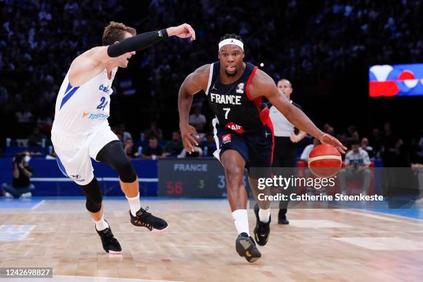 Guerschon Yabusele of France dribbles the ball against Jan Vesely of Czech Republic during the FIBA Basketball World Cup European Qualifiers match...