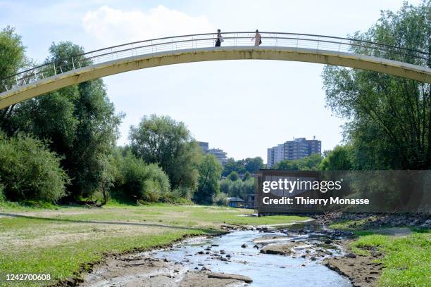 Floating houses sit on the dry bed of the river 'Het Meertje', a tributary of the Waal river, the main distributary branch of the river Rhine on...