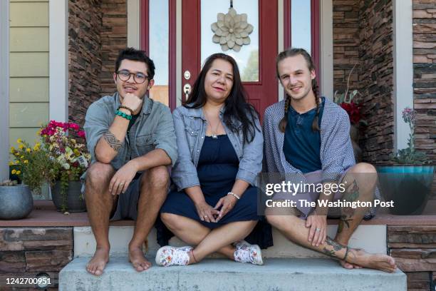 Irwing Bernal , his mother Blanca Moye and his fiancé Ricky Kairos pose together at their home in Victor, Idaho on August 17, 2022. The couple lives...