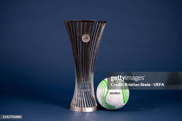 View of the UEFA Europa Conference League 2022/23 Group Stage match ball next to the UEFA Europa Conference League trophy during the UEFA Club...