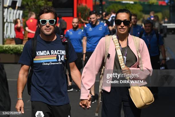Alpine's Spanish driver Fernando Alonso and his grirlfriend Austrian journalist Andrea Schlager arrive ahead of this weekend's Spa-Francorchamps...